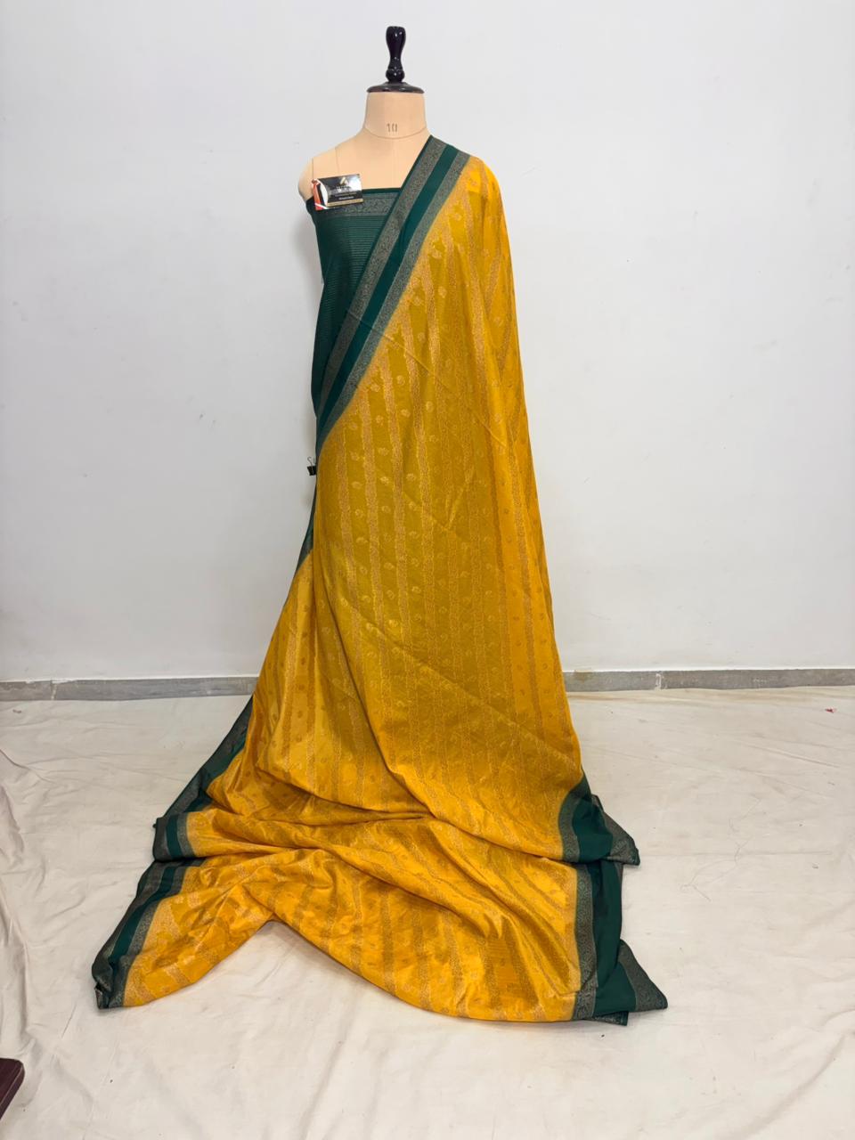 bottle green worm banarasi silk saree ada buti blouse zari work